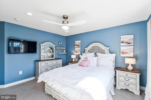 bedroom with carpet floors, ceiling fan, and baseboards