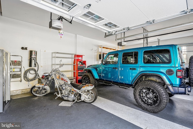 garage featuring a garage door opener