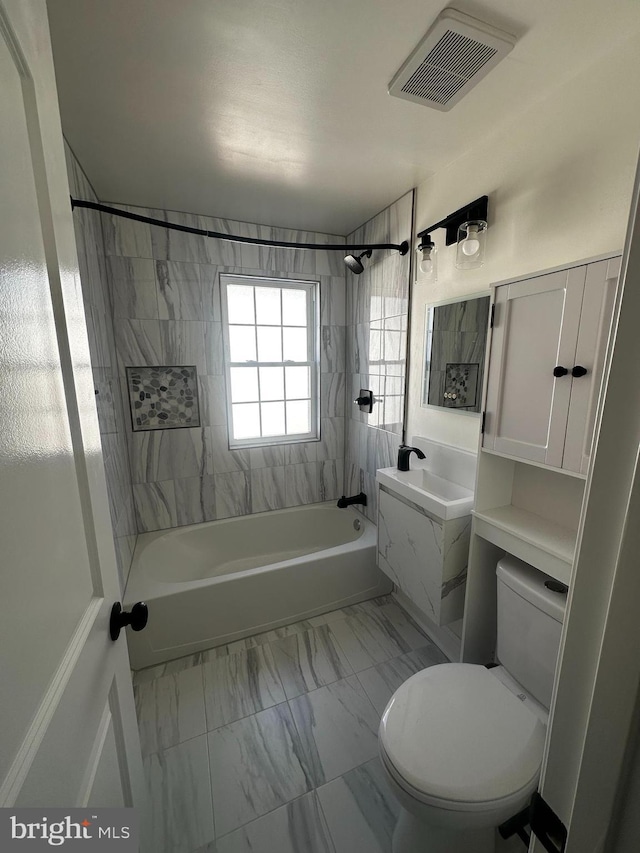 bathroom with shower / washtub combination, marble finish floor, visible vents, toilet, and vanity