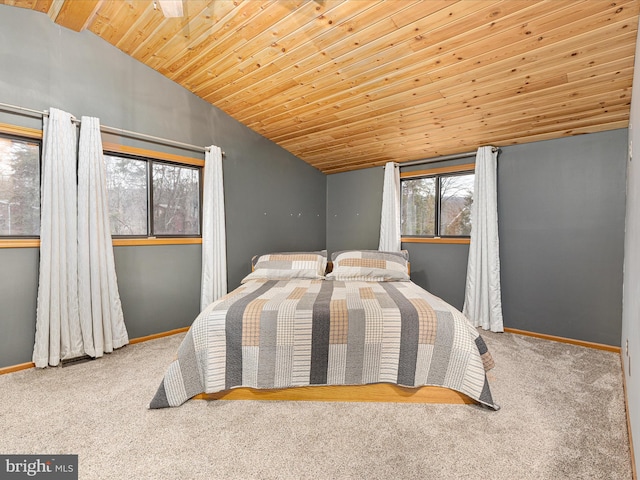 bedroom featuring carpet floors, lofted ceiling, wooden ceiling, and baseboards