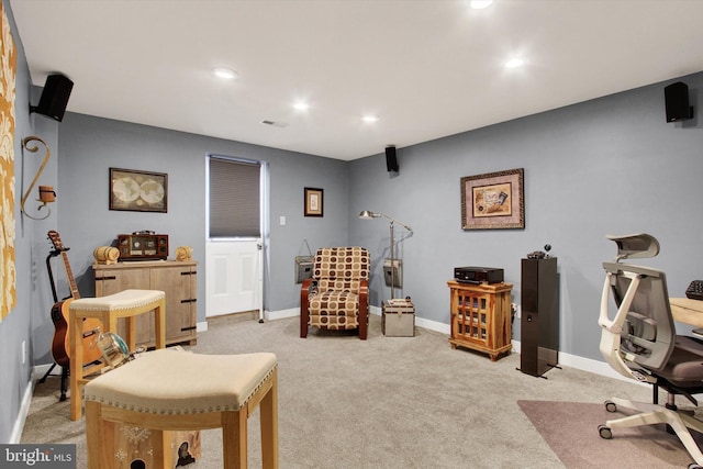 interior space featuring recessed lighting, baseboards, and light carpet