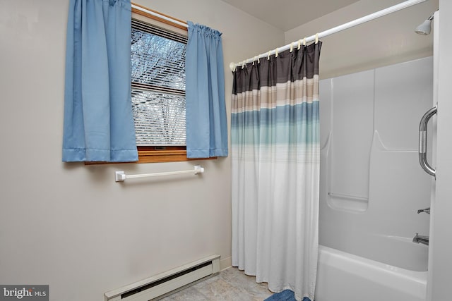 bathroom featuring shower / tub combo and baseboard heating