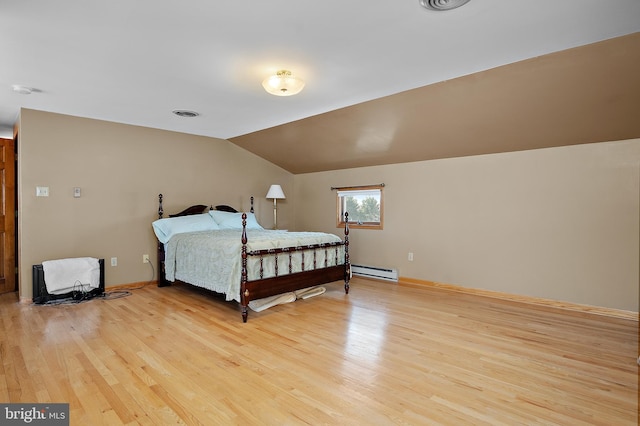 bedroom featuring a baseboard radiator, visible vents, baseboards, vaulted ceiling, and light wood finished floors