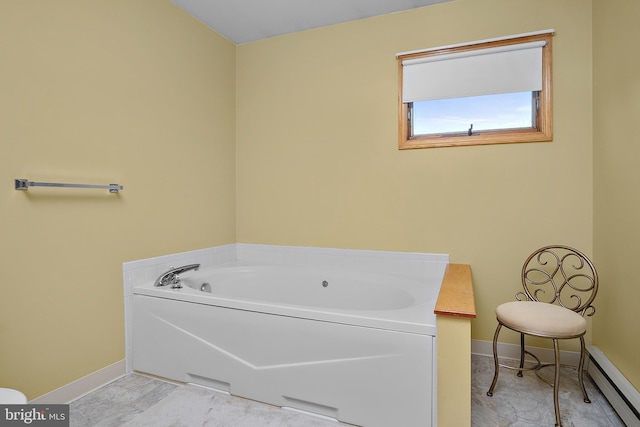 full bath with baseboards, a garden tub, and baseboard heating