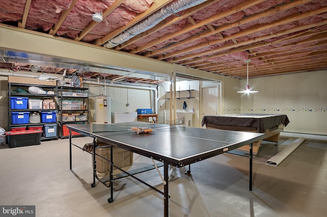 game room featuring water heater and concrete floors