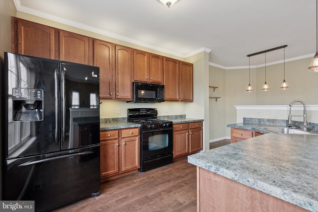 kitchen featuring crown molding, dark wood-type flooring, brown cabinetry, a sink, and black appliances