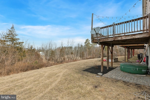 view of yard with a wooden deck