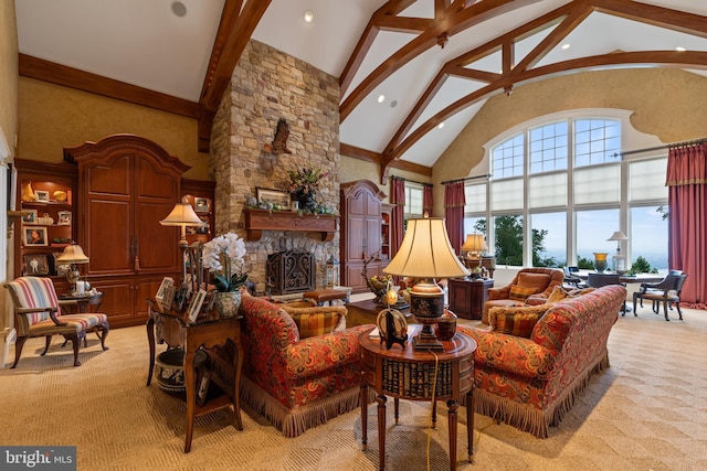 living room with high vaulted ceiling, beam ceiling, light carpet, and a stone fireplace