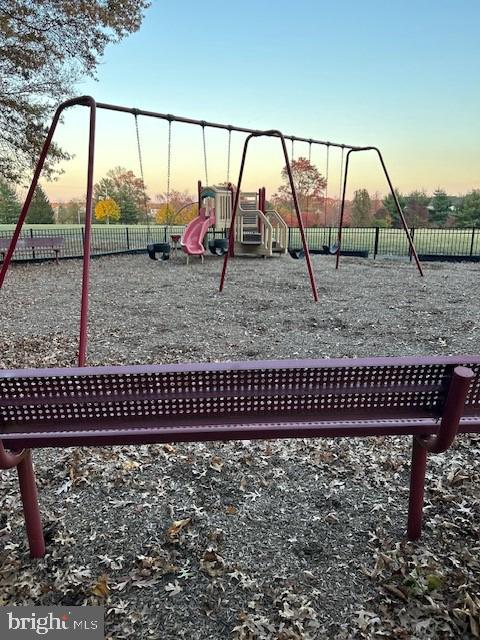 community playground featuring fence