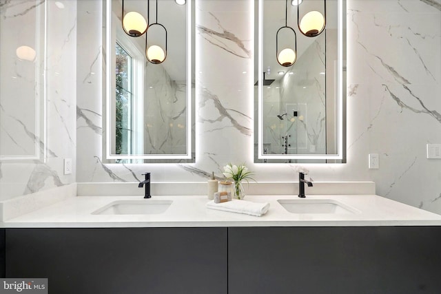 bathroom featuring double vanity and a sink