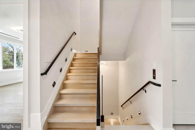 staircase with baseboards