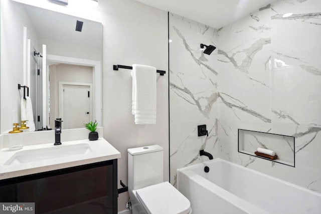 full bathroom featuring toilet, vanity, and shower / tub combination