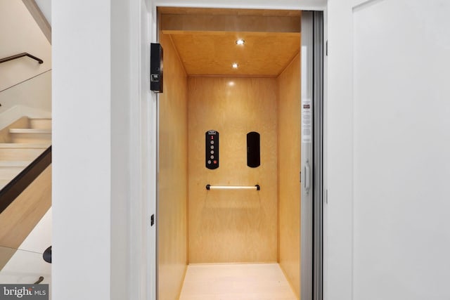 interior details with elevator and recessed lighting