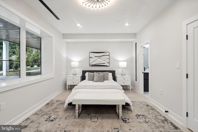 bedroom with recessed lighting, light wood finished floors, and baseboards