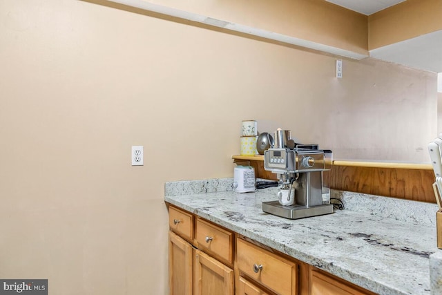 kitchen with light stone counters