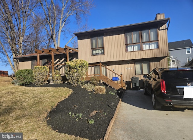 view of front of home with a chimney