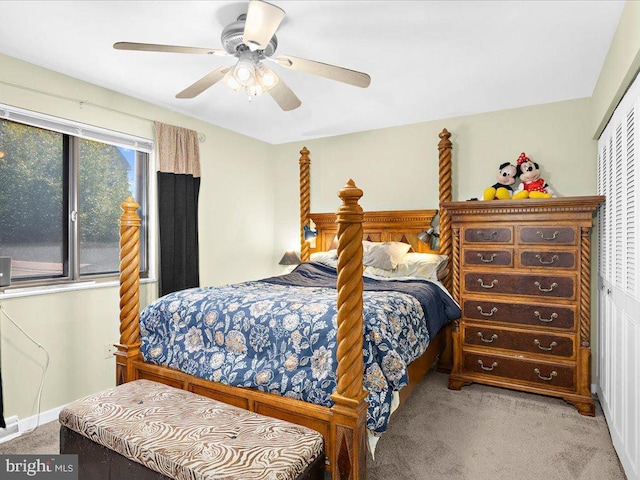 bedroom featuring a closet, ceiling fan, and carpet floors