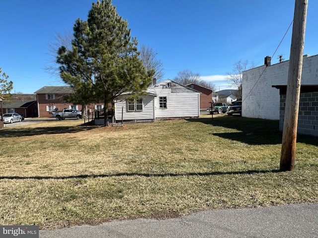 exterior space with a yard