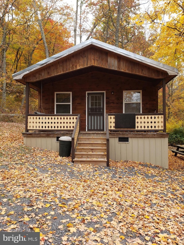 rustic home with a porch