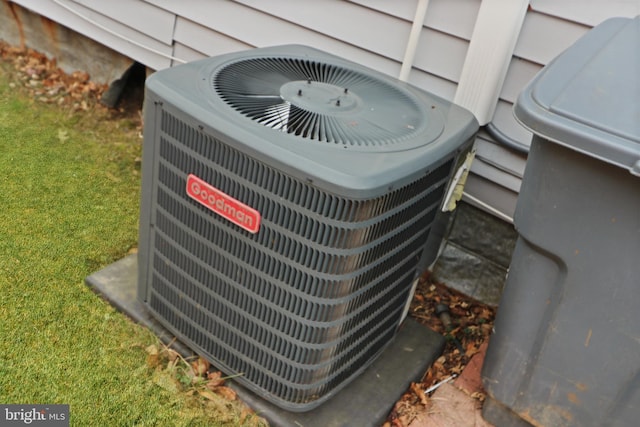 exterior details with a ceiling fan and central AC unit