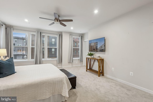 bedroom with a ceiling fan, recessed lighting, carpet flooring, and baseboards