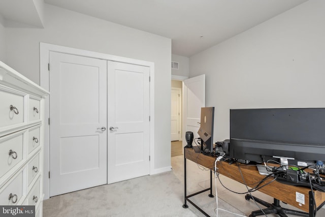 home office featuring light carpet and visible vents