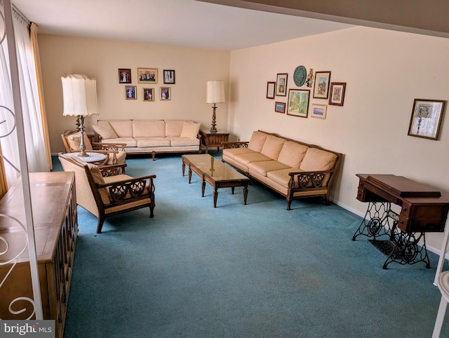 living room featuring baseboards and carpet