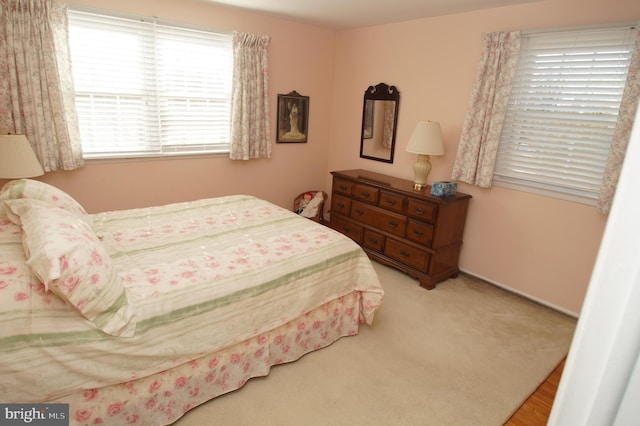 bedroom featuring carpet