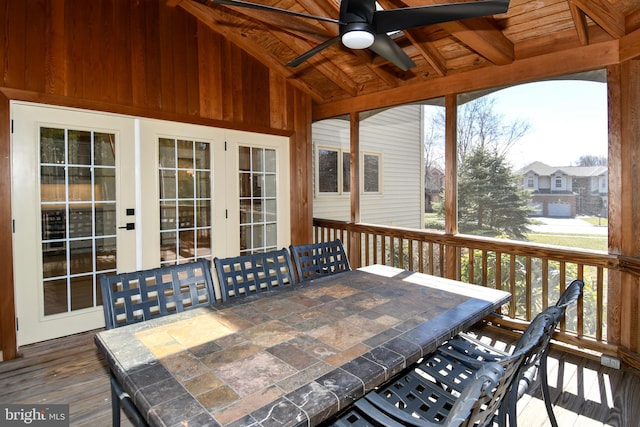 sunroom / solarium featuring wood ceiling, ceiling fan, and lofted ceiling with beams