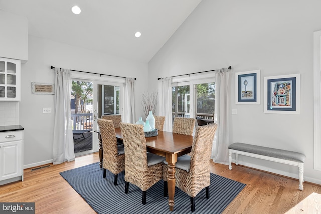 dining area featuring light wood-style flooring, visible vents, a healthy amount of sunlight, and recessed lighting