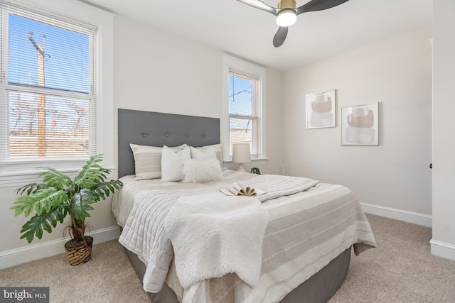 bedroom with carpet flooring, ceiling fan, and baseboards