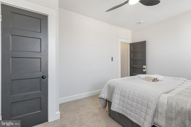 bedroom featuring ceiling fan, baseboards, and carpet flooring