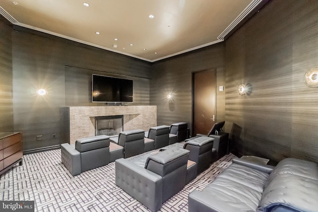 home theater featuring light carpet, a fireplace, crown molding, and recessed lighting