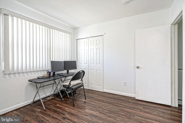 office with baseboards and wood finished floors