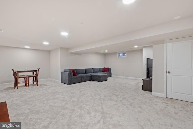 living area with visible vents, recessed lighting, carpet, and baseboards