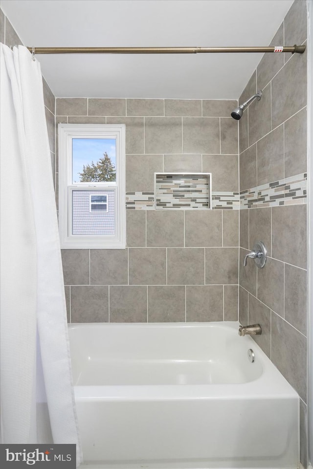 full bath featuring shower / bath combination with curtain