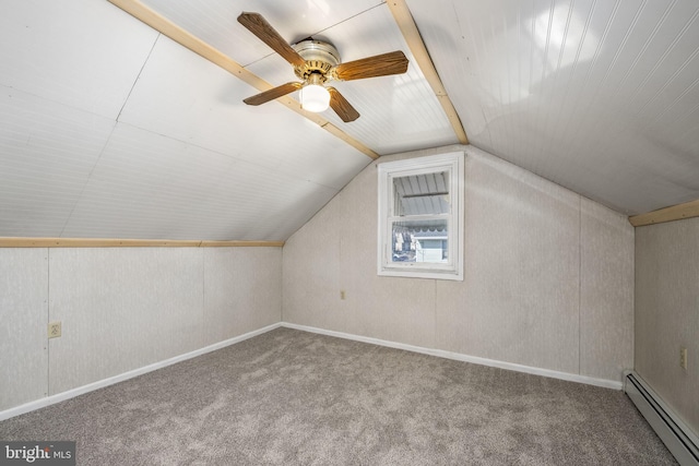 bonus room featuring a baseboard heating unit, lofted ceiling, carpet, and a ceiling fan