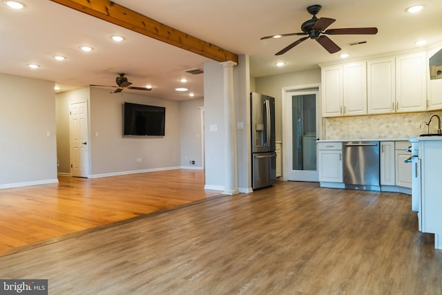 365 Heritage Way, Tuckerton, NJ 08087 - kitchen featuring light countertops, appliances with stainless steel finishes, backsplash, and light wood-style floors