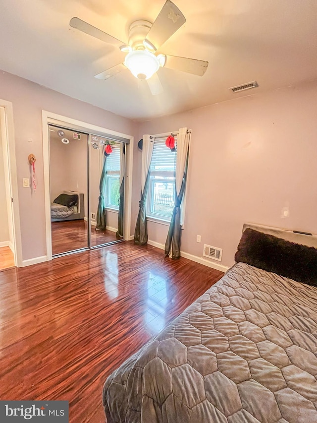 365 Heritage Way, Tuckerton, NJ 08087 - unfurnished bedroom with a ceiling fan, wood finished floors, visible vents, and baseboards