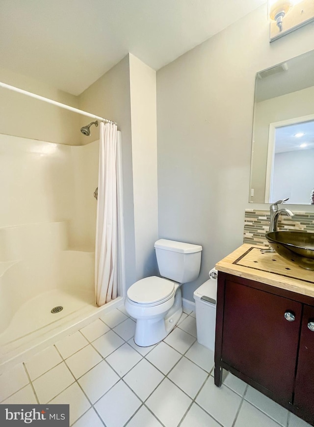 365 Heritage Way, Tuckerton, NJ 08087 - bathroom featuring toilet, curtained shower, tile patterned flooring, vanity, and backsplash