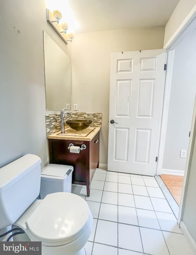 365 Heritage Way, Tuckerton, NJ 08087 - bathroom featuring tasteful backsplash, baseboards, toilet, tile patterned floors, and vanity