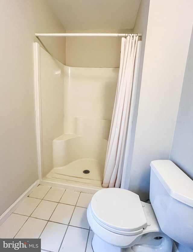 365 Heritage Way, Tuckerton, NJ 08087 - bathroom with tile patterned flooring, a shower stall, and toilet