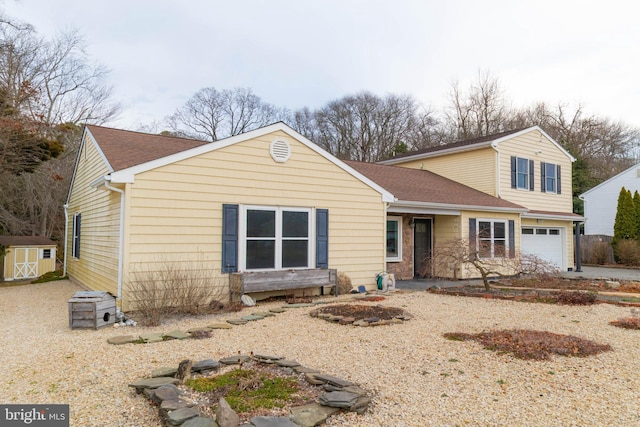 365 Heritage Way, Tuckerton, NJ 08087 - traditional home with a garage, a shed, an outbuilding, and roof with shingles