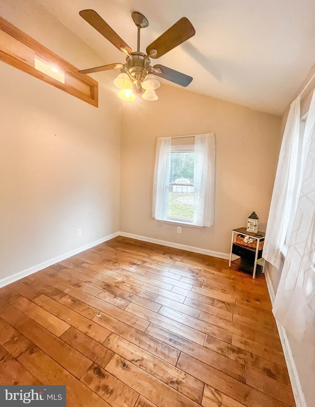 365 Heritage Way, Tuckerton, NJ 08087 - unfurnished room with a ceiling fan, vaulted ceiling, baseboards, and wood finished floors