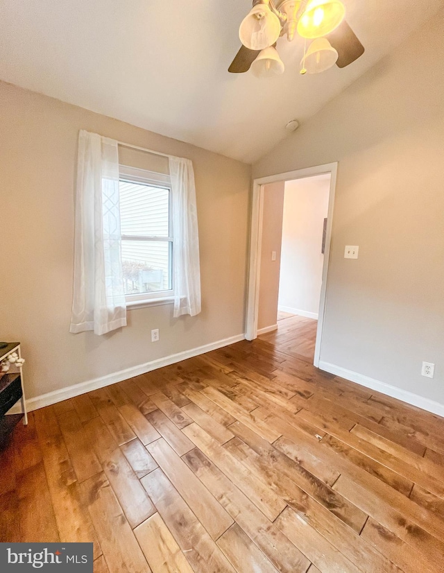 365 Heritage Way, Tuckerton, NJ 08087 - empty room with lofted ceiling, ceiling fan, baseboards, and wood finished floors