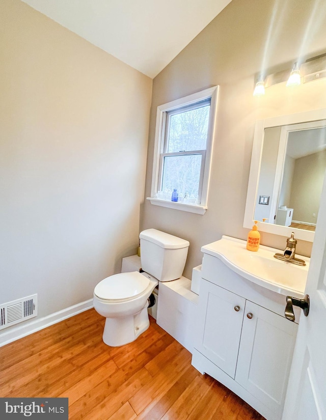 365 Heritage Way, Tuckerton, NJ 08087 - bathroom with visible vents, toilet, wood finished floors, vaulted ceiling, and vanity