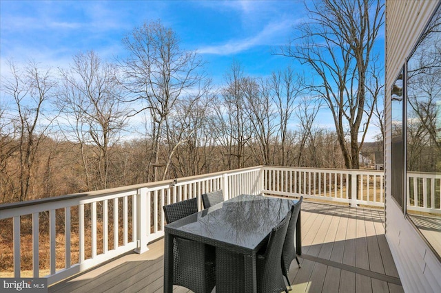 deck featuring outdoor dining space