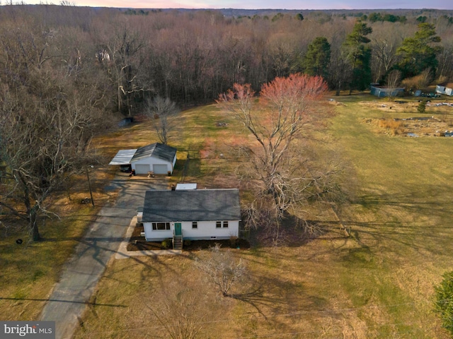 aerial view featuring a view of trees