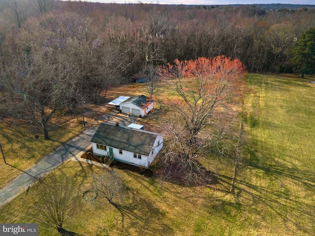 bird's eye view featuring a view of trees