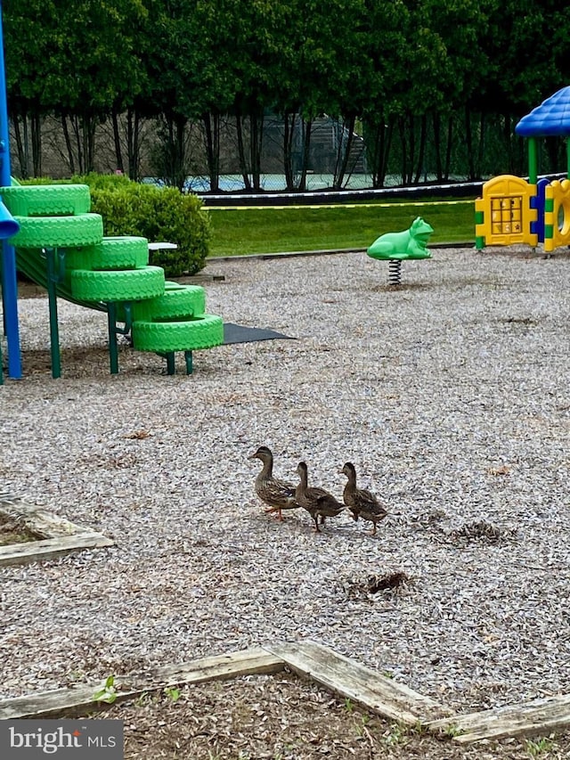 view of property's community with playground community